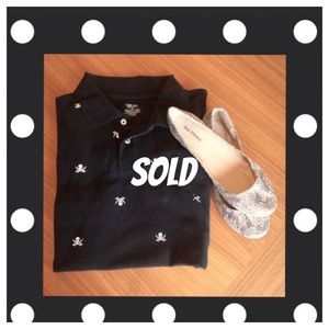 Black skull& cross swords cotton polo style top.